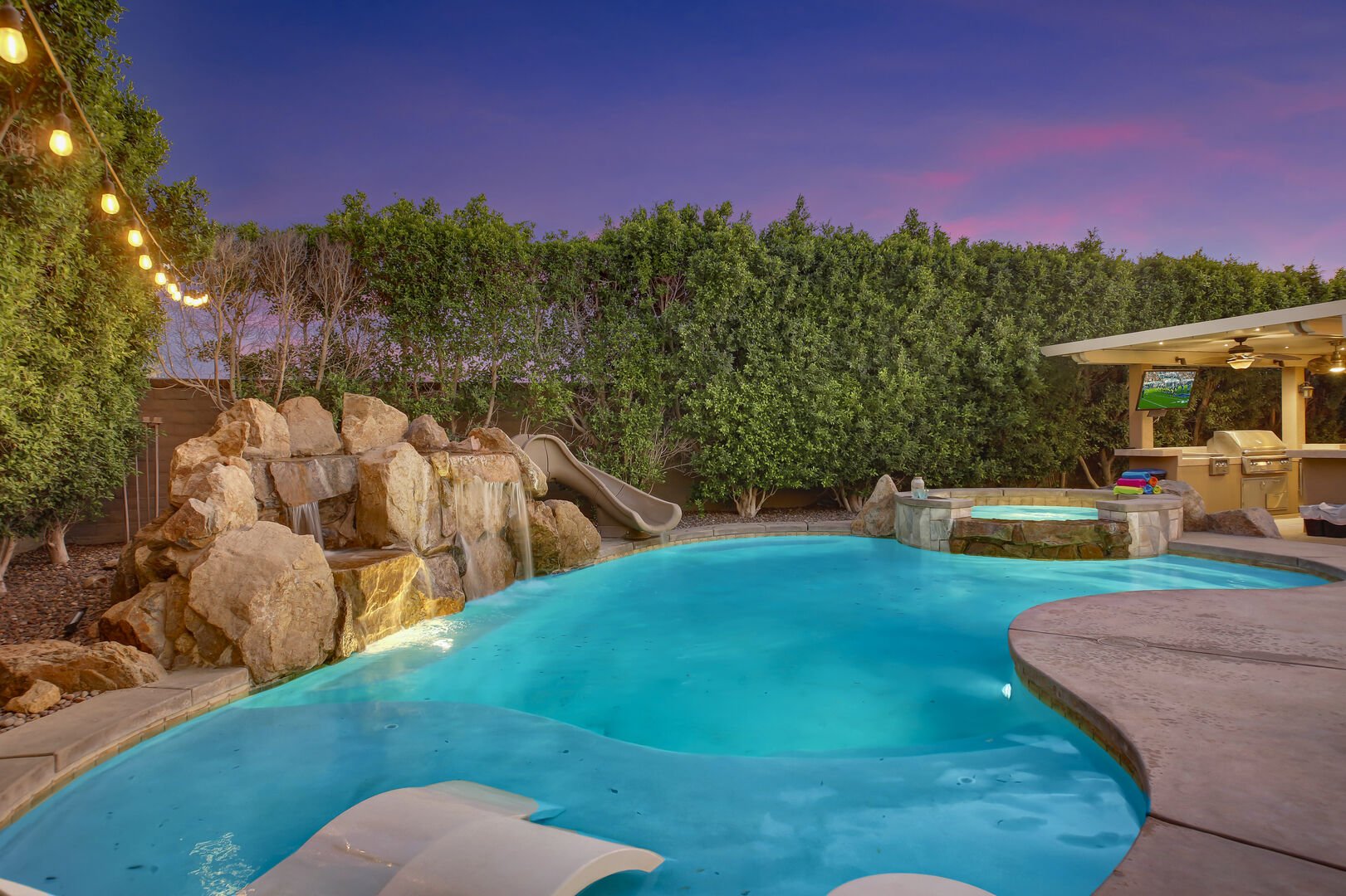 The large pool features an amazing waterfall feature!