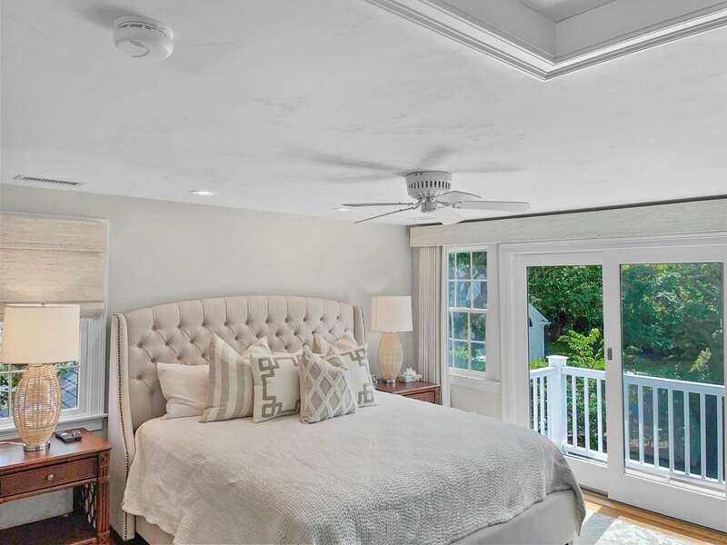 Bedroom 3 King bed and Balcony overlooking backyard -  26 Sea Mist Lane South Chatham Cape Cod - New England Vacation Rentals