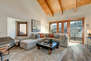 Living Room with over-sized plush sectional, beautifully modern decor, gas fireplace, 55