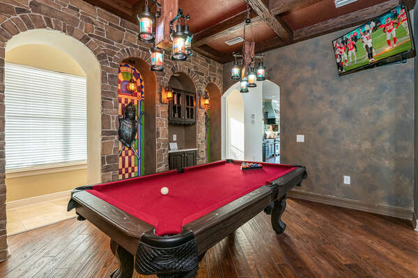 Catch up on your favorite sports while enjoying a game of pool