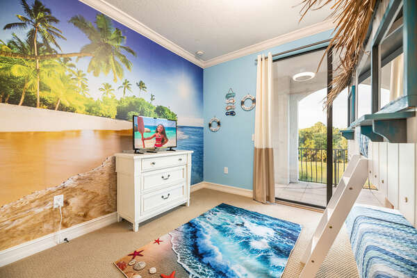 This beach-inspired bedroom on the third floor features a twin/twin bunk bed with shared balcony and bathroom