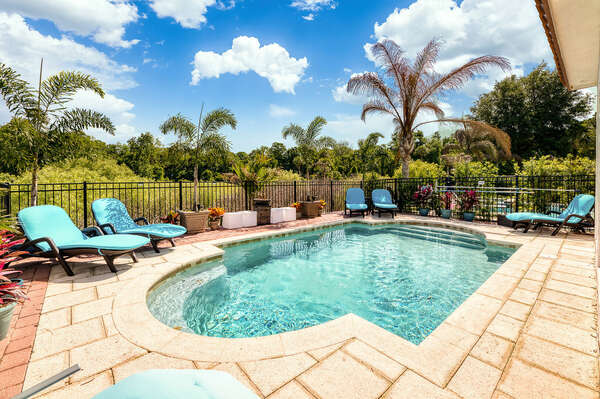 Soak up the Florida sunshine in one of the poolside loungers