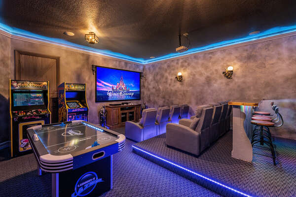 The combined theater and game room is sure to be a family favorite