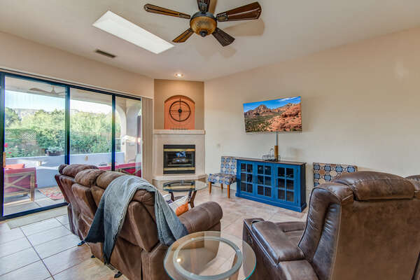 Family Room with a Smart TV and Patio Access