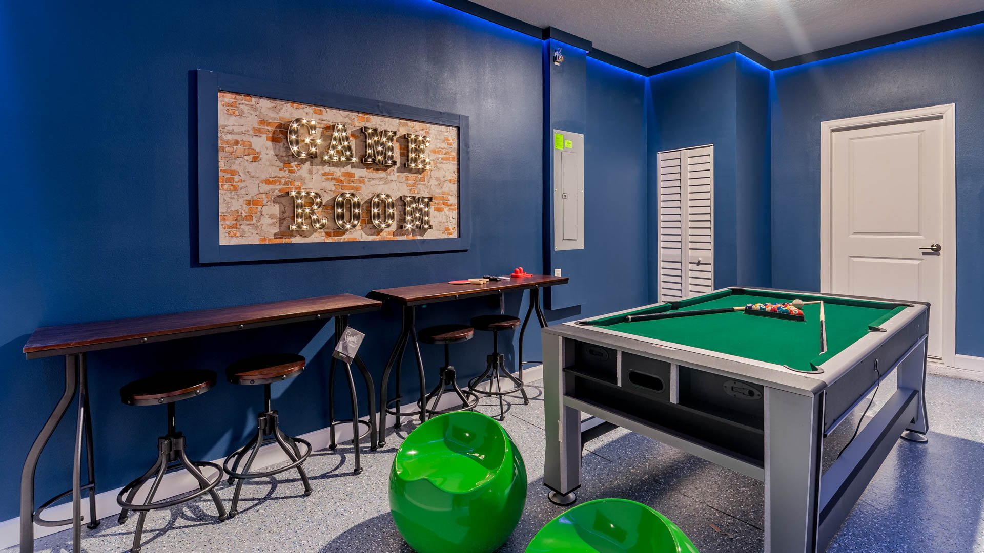 Game Room (Angle)Pool Table flips to Air Hockey.Also Has a ping pong table topper