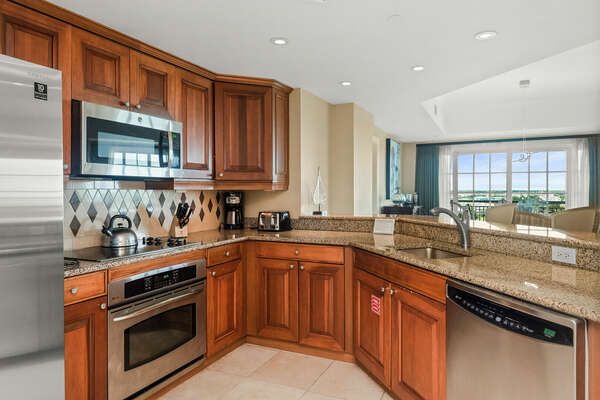 Cook delicious meals in the fully equipped kitchen with stainless steel appliances