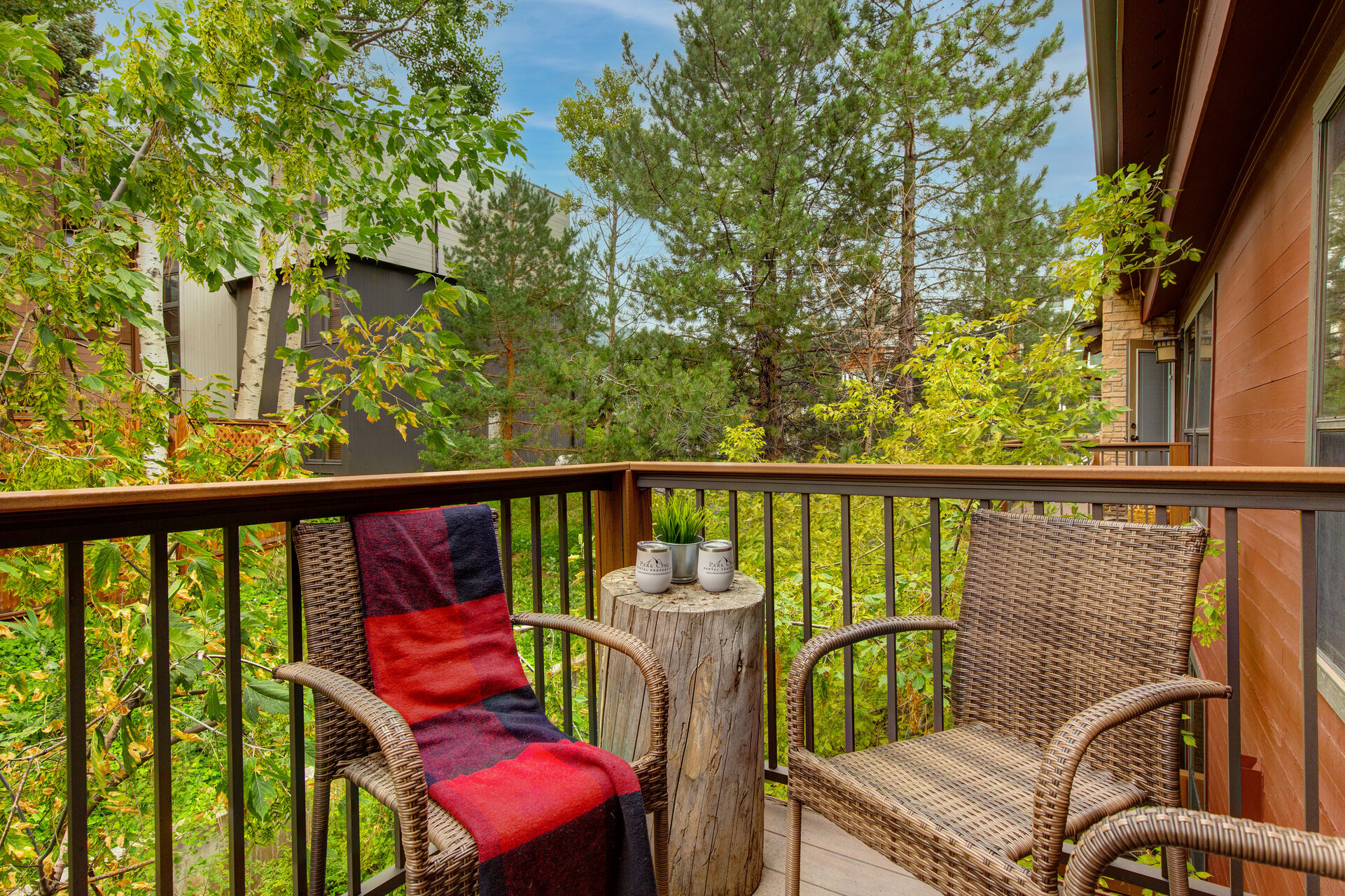 Private Balcony off of Living/Dining Room with seating for up to four and BBQ Grill