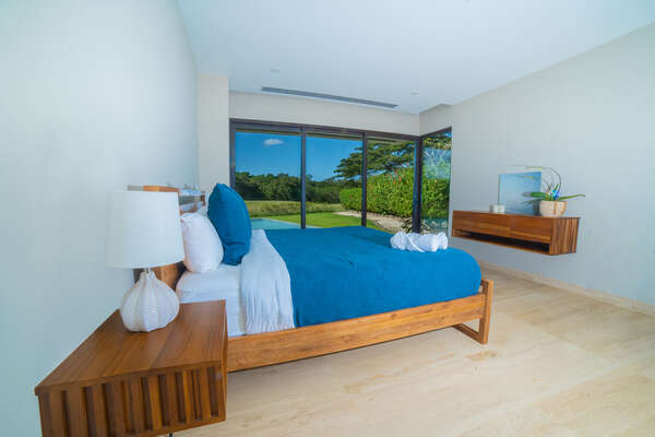 Master Bedroom 1 King Bed with Ensuite Bathroom and terrace to the pool