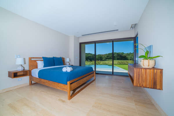 Master Bedroom 1 King Bed with Ensuite Bathroom and terrace to the pool