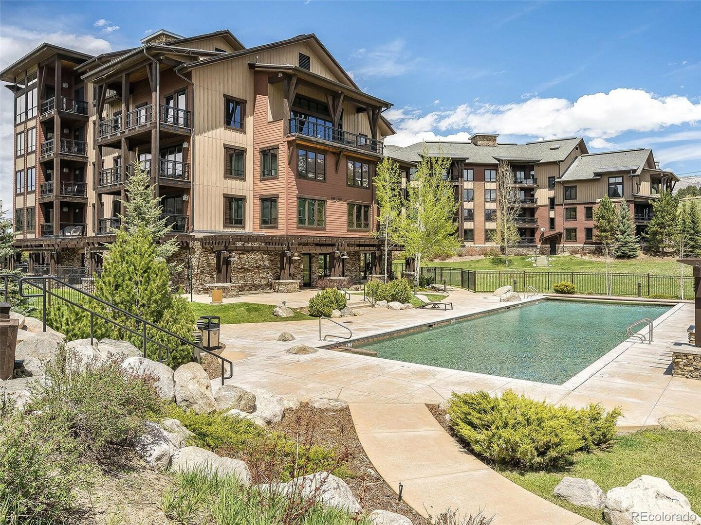 Enjoy an outdoor heated pool at this 2 bedroom/2 bath condo in Trailhead Lodge!