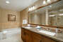 Master bathroom with double sinks.
