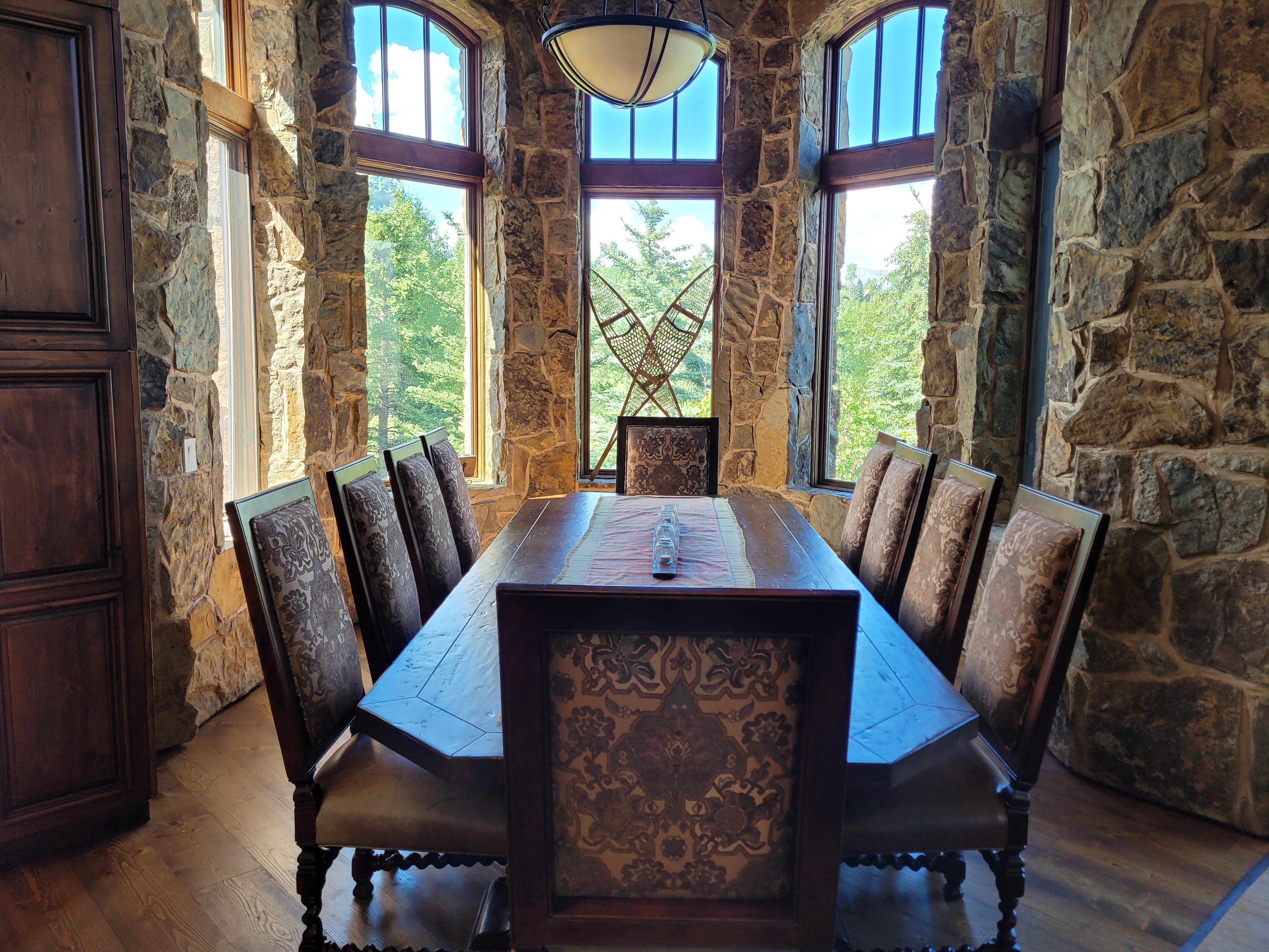Luxury dining room with stone walls