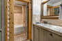 Master Bath with a Stone Counter Sink and Separate Tub/Shower Combo