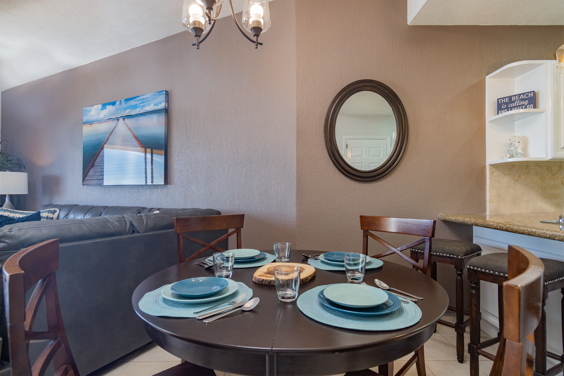 Plenty of room for everyone! The dining area includes 4 chairs and 4 counter stools.