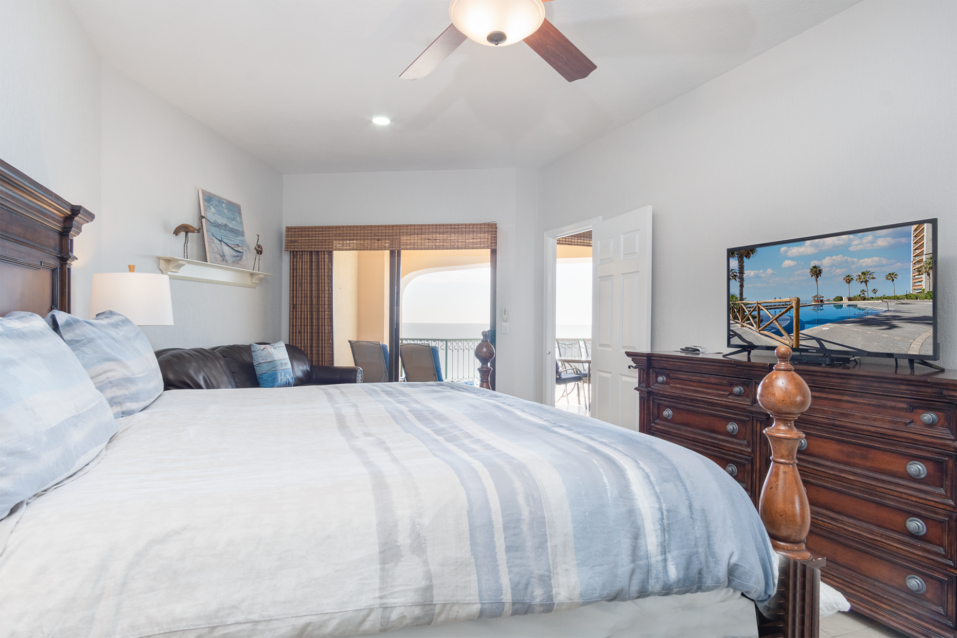 Master suite opens to the balcony and has a NEW smart 42" TV with Netflix and DirecTV!