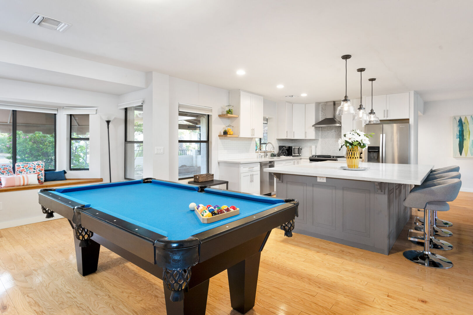 Pool Table Near Large Kitchen