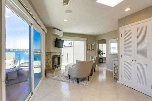 Master Suite w/ Sitting Area, Fireplace, Deck w/ Bay Views & Seating