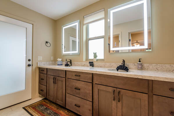 Master Bath with Two Sinks and Lighted Mirrors
