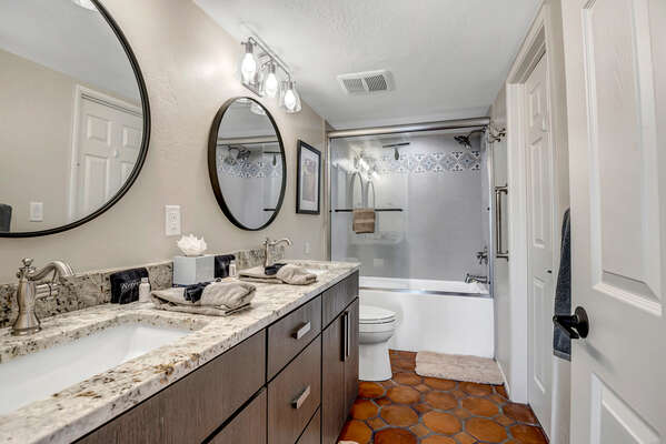 Full Shared Bathroom Three (Lower Level) with Dual Sinks and Tub/Shower Combo