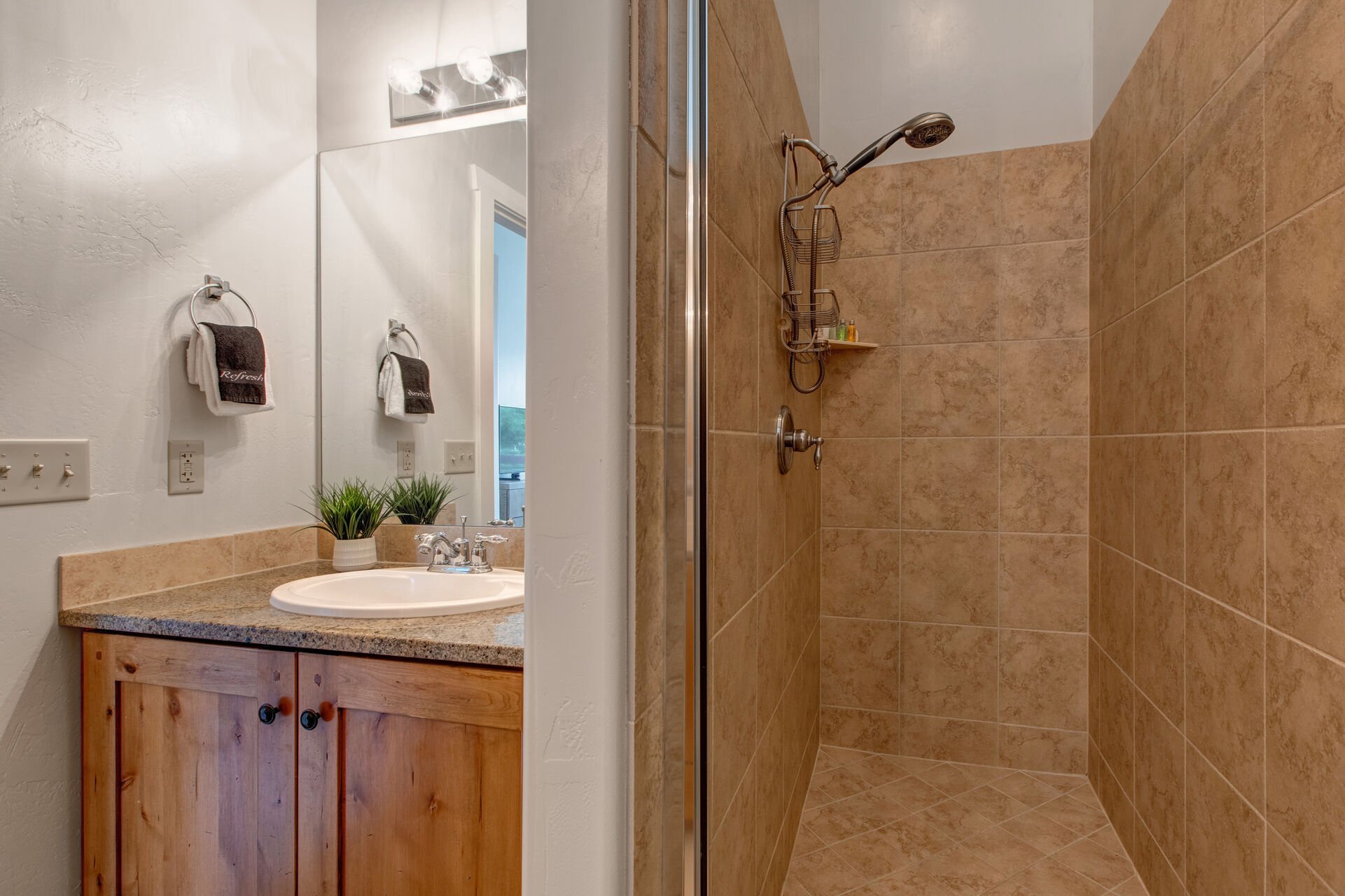 Master Bathroom with tiled shower