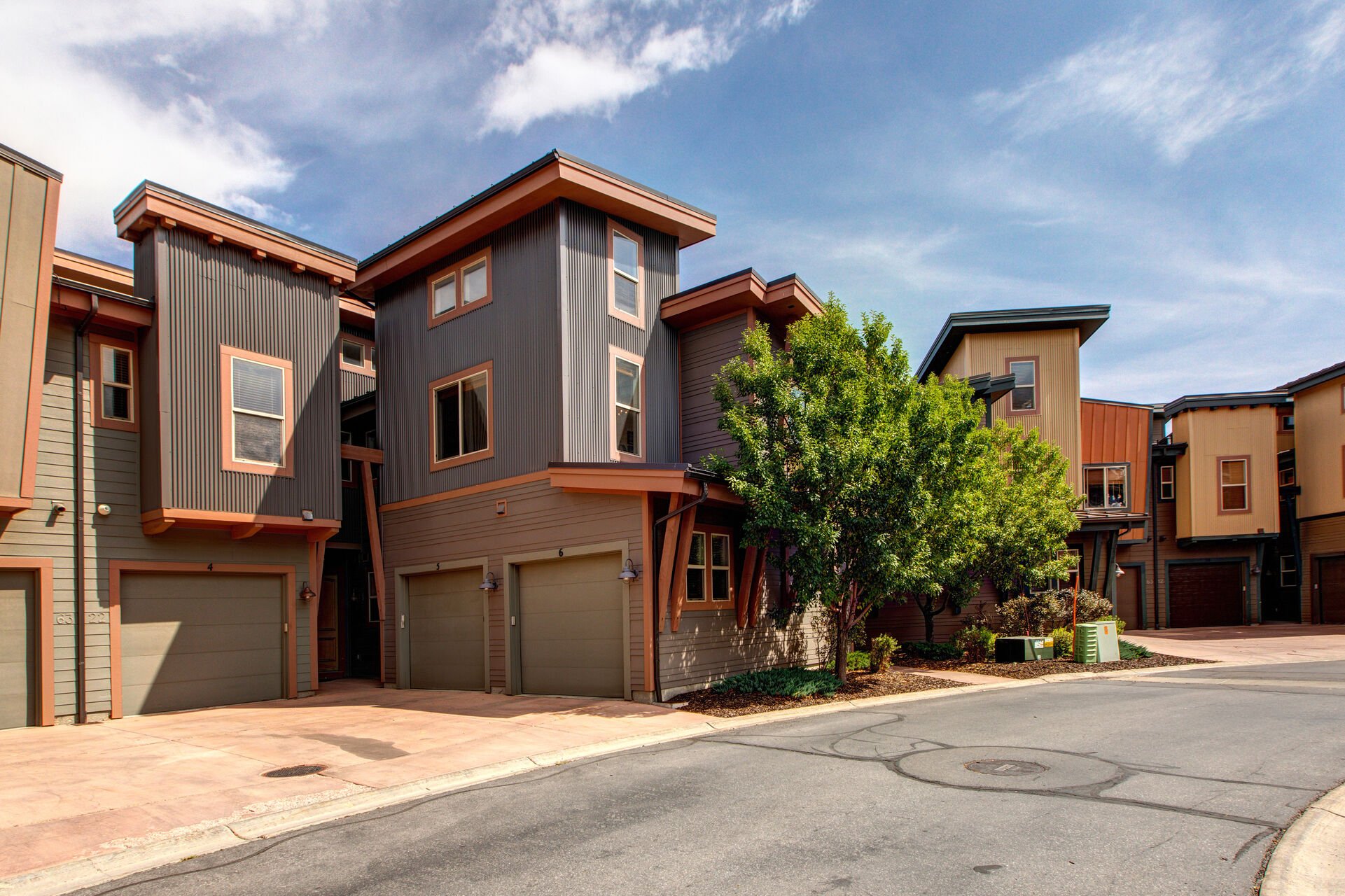 Front of building and private 1-car garage