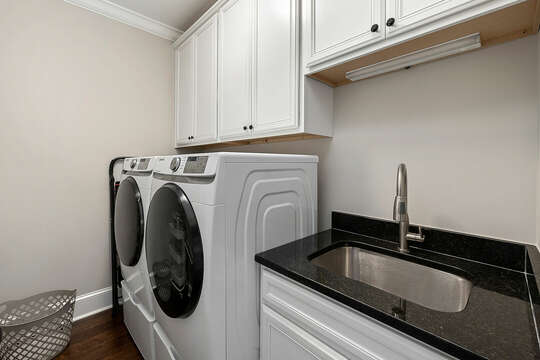 Laundry Room with utility sink and plenty of storage
