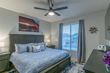 Bedroom 4 is on the second floor and boasts the standard king bed, TV and ceiling fan.
