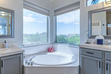 Soak away your stress in the sumptuous garden tub with amazing views.