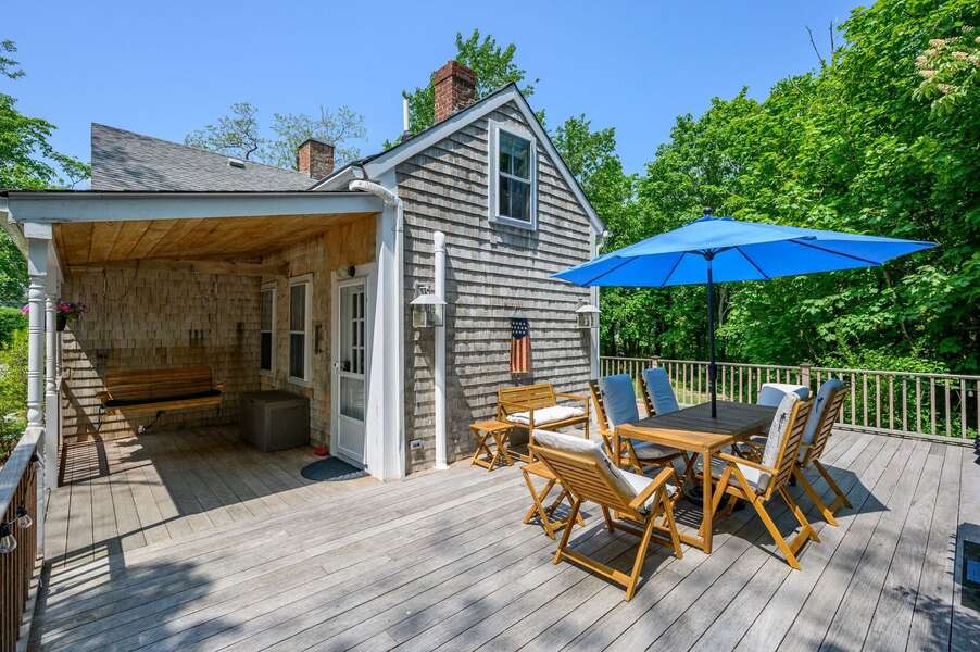 Outdoor dining at the large table - 98 West Road Orleans Cape Cod New England Vacation Rentals