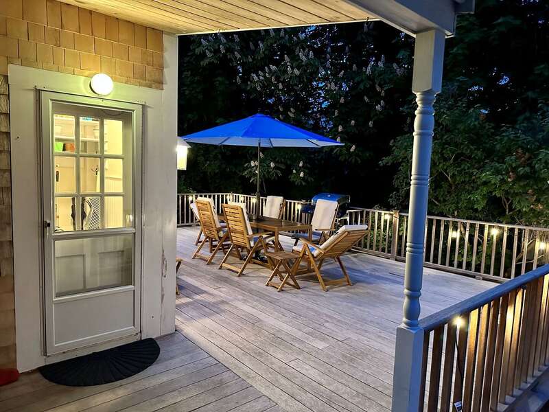 Side entry at night with welcoming light - 98 West Road Orleans Cape Cod New England Vacation Rentals