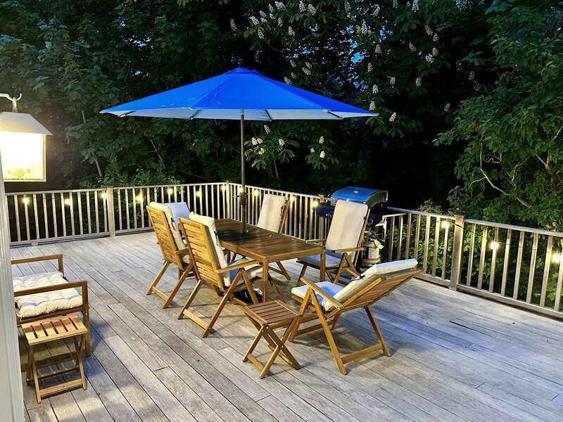 Dine al fresco under the stars with ambient lighting - 98 West Road Orleans Cape Cod New England Vacation Rentals