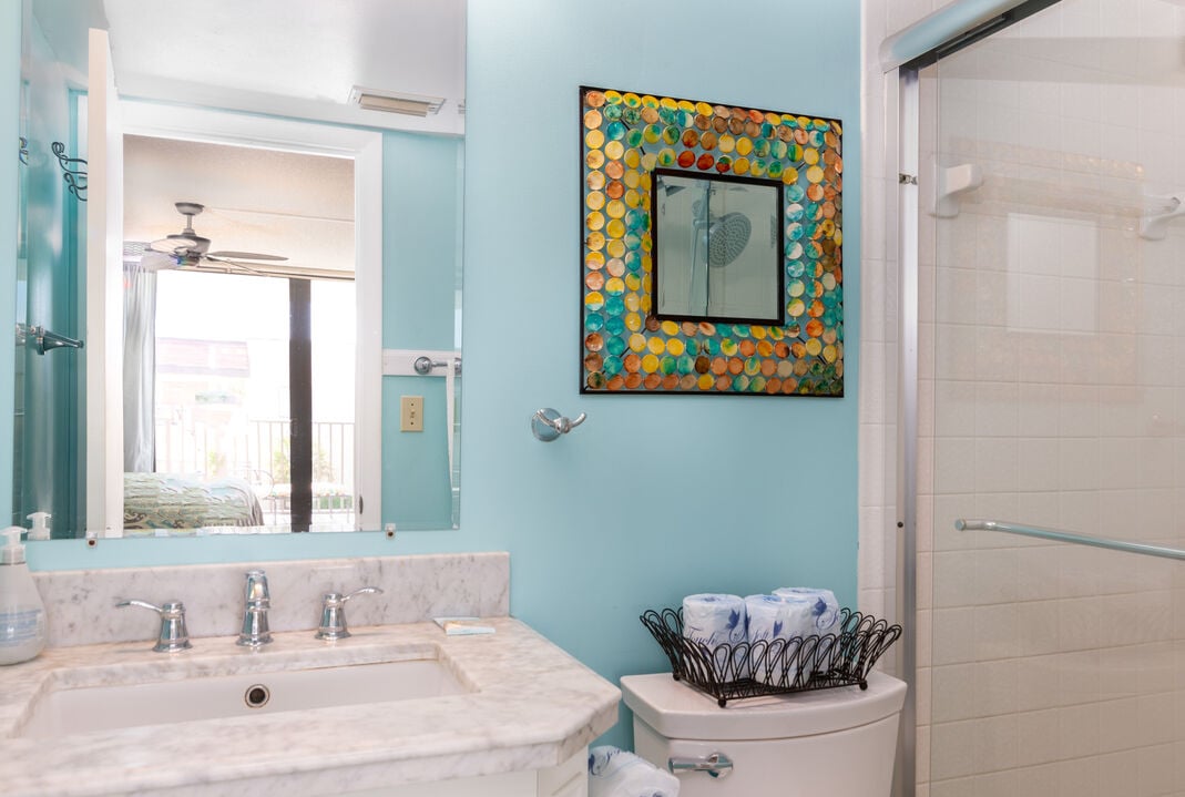 Stylish bathroom with a walk-in shower and vibrant decor