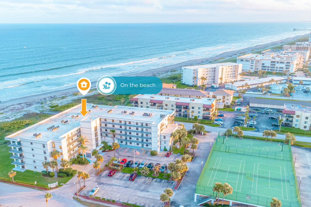 Aerial view of Cape Winds, located right on the beach.