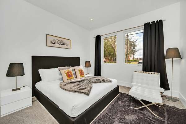 Enjoy this comfortable bedroom with a king-sized bed
