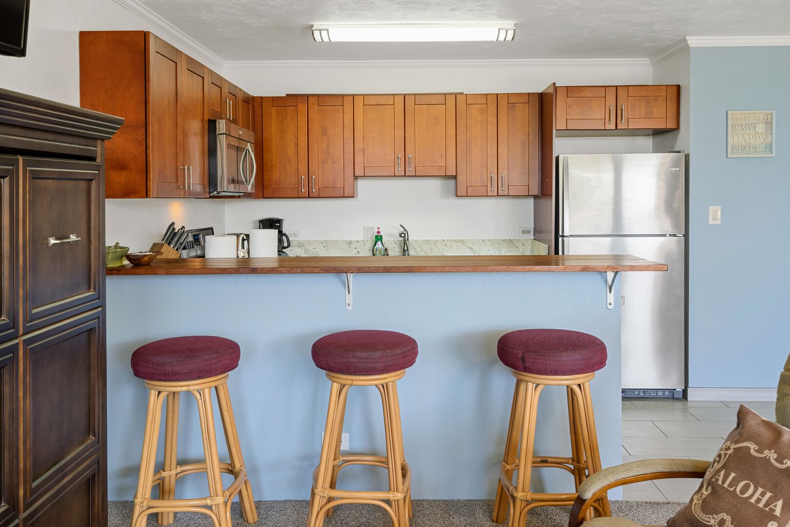 Barstools at the large kitchen island.