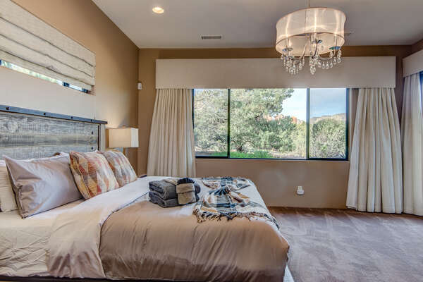 Master Bedroom with a King Bed,  a Smart TV and Red Rock Views