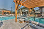 Clubhouse with ample seating and furnishings, fully equipped gym, pool, and hot tub