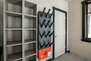 Private boot and ski storage room with boot dryers