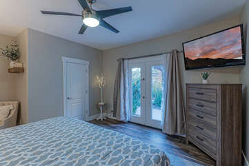 Bedrooms 3, 4 and 5 have king beds, TVs and ceiling fans as shown in Bedroom 5.