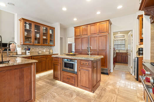 Spacious Gourmet Kitchen with High-end Stainless Steel Appliances