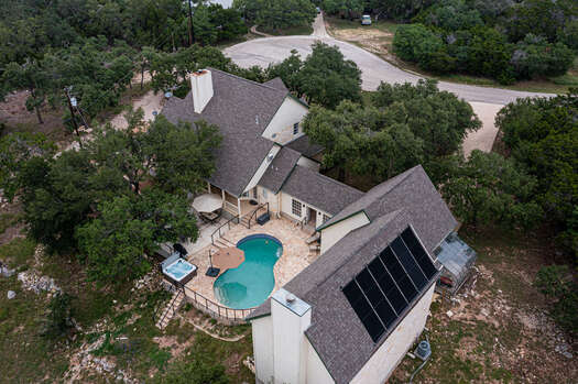 Arial view of large private pool and yard