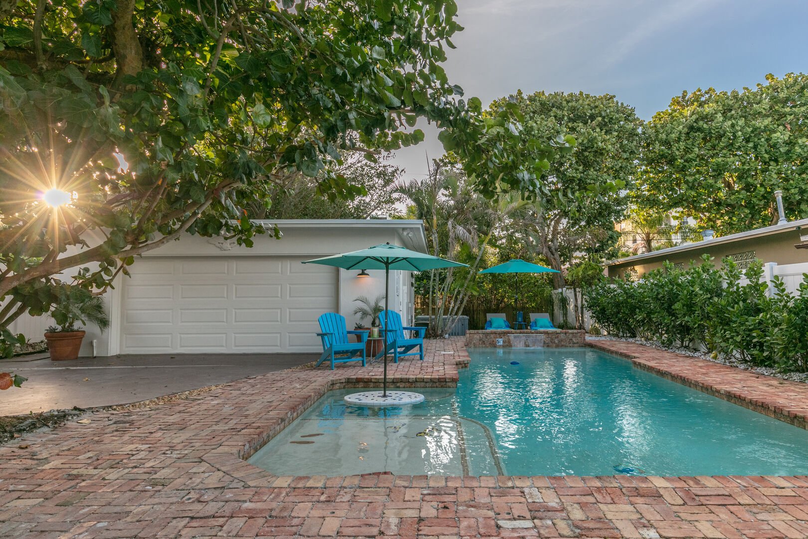 TWO houses, ONE Property! Many amenities, including a Game Room, Heated Pool, and 2 Hot Tubs!