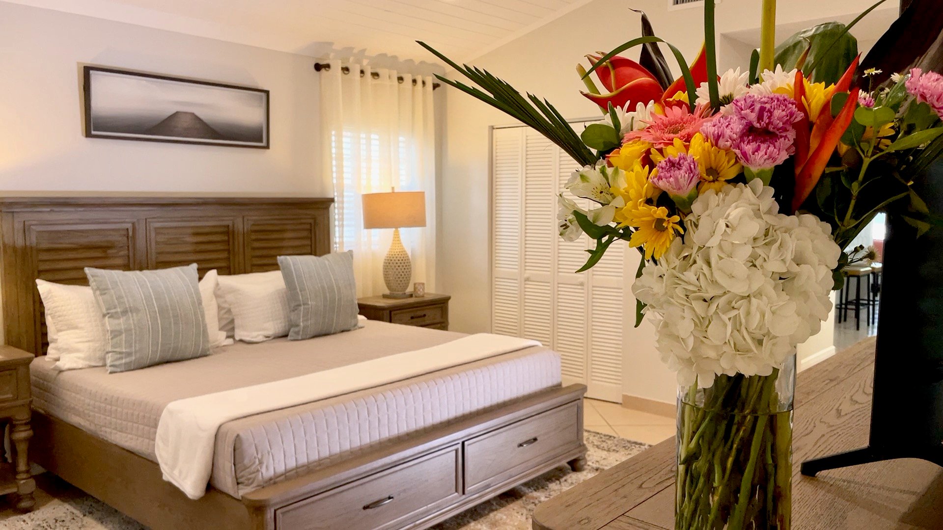The master bedroom is also host to two gorgeous floral vases, and a large closet perfect for storing clothes and luggage alike during your stay.