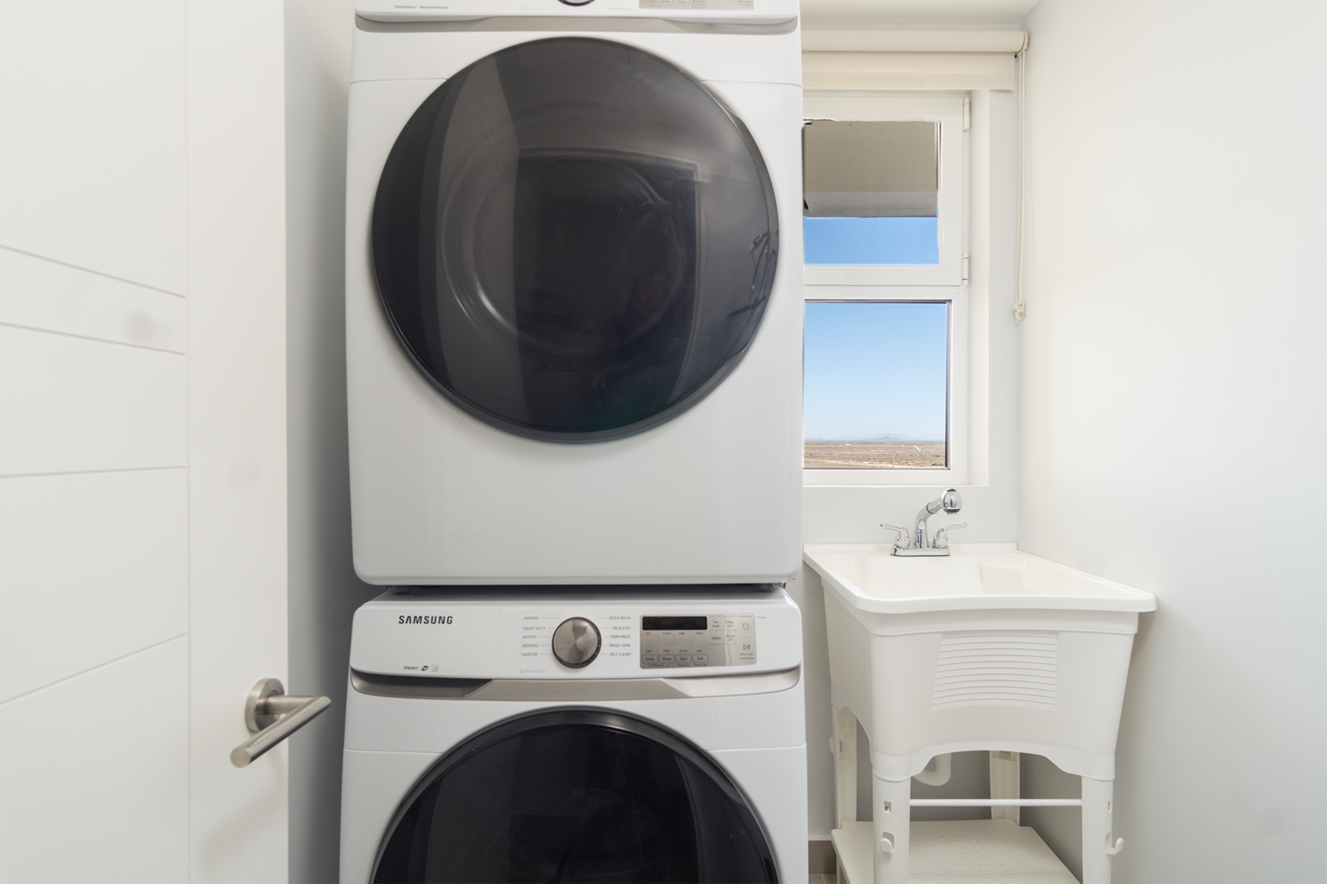 utility room with washer and dryer