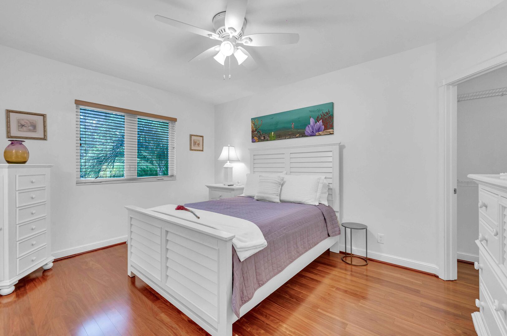 The third bedroom also features a queen-sized bed and a wall mounted 40" Smart T.V.
