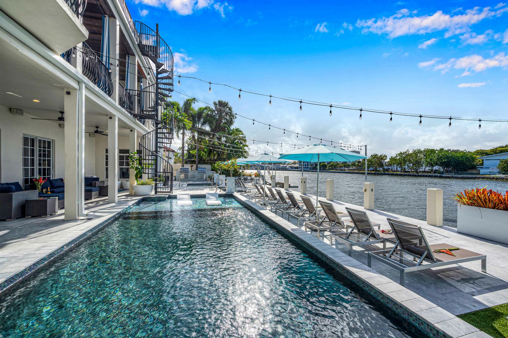 Waterfront tranquility from the heated pool and canal views with a 100 feet dock.