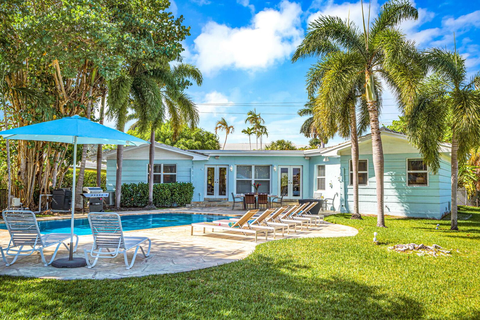 This quaint Floridian ranch style home features an ample garden with a heated pool and 180'' of waterfront.