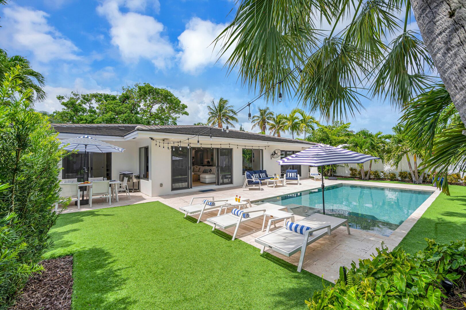 This modern coastal ranch style residence is a haven by definition, designed for tranquility.