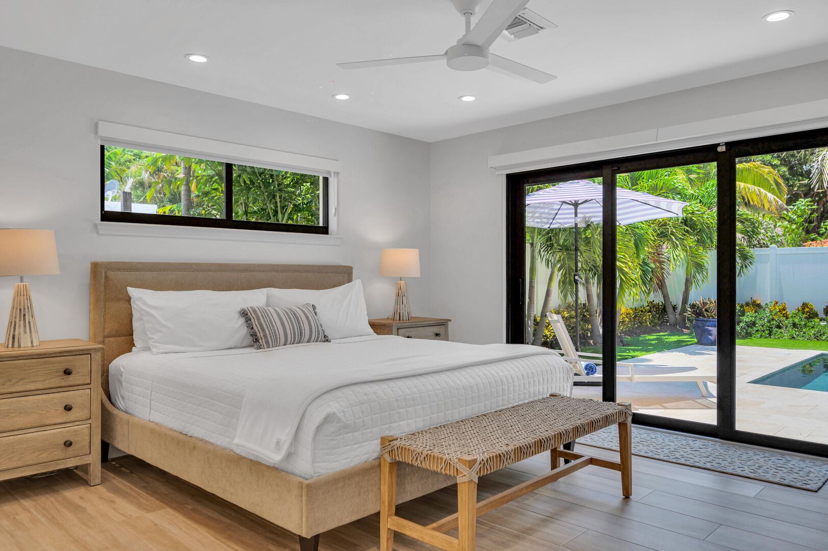 Master Bedroom comes with a King-sized bed, master bathroom and pool access.