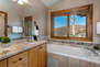 Master Bath with a Jetted Tub and Mountain Views